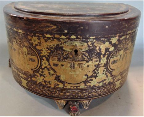A good eastern ebonised lacquered chinoiserie caddy of D shaped form, the hinged lid enclosing a tin canister, decorated with