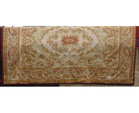 Large Aubusson style needlepoint tapestry panel, 2.8 x 1.8m depicting classical floral motifs in soft earthy colours with rus