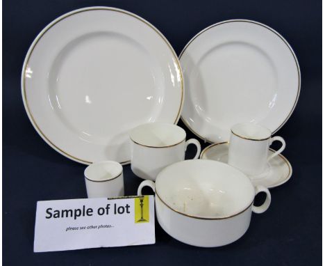 A quantity of Royal Doulton white glazed wares with simple gilt border decoration, including twelve dinner plates, ten breakf