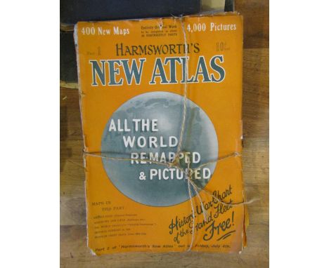 A collection of Harmsworth's New Atlas - Part 1 - Part 40, further atlases and maps, together with a box containing a collect