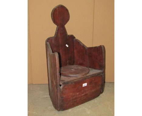 A primitive country made child's commode elm chair of figural form with outstretched arms, together with an oval coopered tub