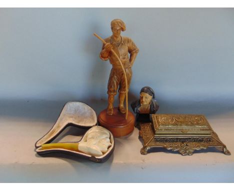 Treen carving of a gondolier, 30cm high, together with a further Meersham pipe of an Arabic gentleman, a further black forest