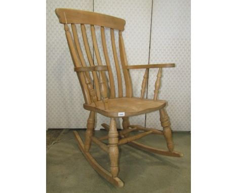 A modern Windsor beechwood lathe back rocking armchair (AF) together with a nursing chair with cane panelled seat and back a 