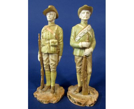 A pair of Royal Worcester Boer War series figures decorated in pale green and gilt, one showing The Colonial Trooper, with gr