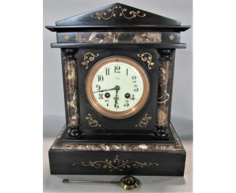 Victorian black slate and specimen architectural mantel clock with twin train movement, 31cm high, pendulum 