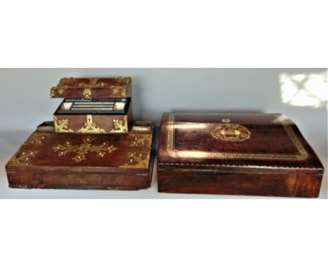 19th century burr walnut and brass strap work desk top writing slope, the raised top with hinged lid enclosing a waterfall in