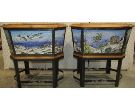 A pair of pine and ceramic jardinieres of elongated octagonal form enclosing hand painted porcelain panels showing marine lif