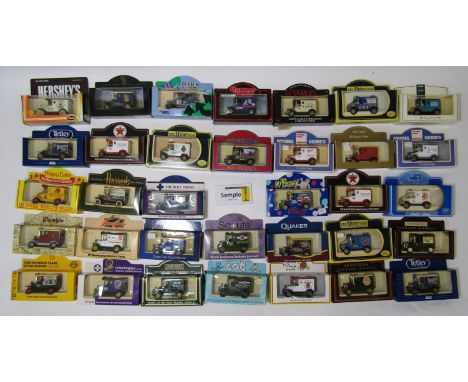 58 boxed Lledo model vehicles, all Ford T4 vans, commemorating British businesses and anniversaries including Dads Army, Pers