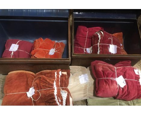 Large quantity of unsorted pairs of velvet curtains in various colours and sizes, contained in 2 tin trunks (displayed in fur
