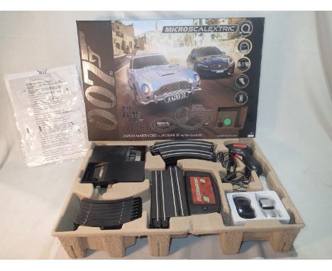 Boxed Microscalextric 007 No Time to Die set, complete with paperwork and in excellent condition. UK P&amp;P Group 1 (£16+VAT