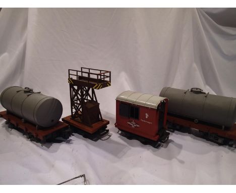 G scale L.G.B, four unboxed wagons, overhead wire maintenance truck, fire department cabin wagon and two bogie tankers, mostl