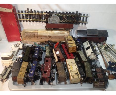 Quantity of vintage O gauge rolling stock and trackside to include Jep and Erno. Items appear in play worn condition. UK P&am