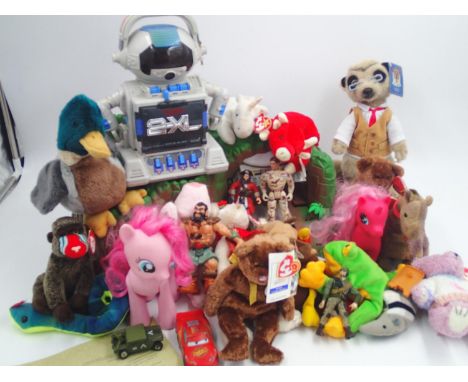 30 mixed unboxed toys to include an incomplete Tracy Island from Thunderbirds, Ty Beanie Babies and a Tomy Robot. Not availab