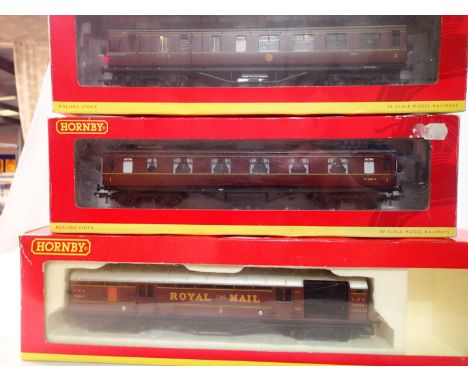 Three OO scale Hornby coaches, LMS T.P.O LMS brake/3rd, and BR 1st class, very good condition, boxes are fair. UK P&amp;P Gro