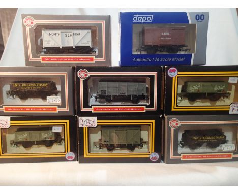 Eight Dapol OO gauge wagons, mostly excellent condition, wear to boxes. UK P&amp;P Group 1 (£16+VAT for the first lot and £2+