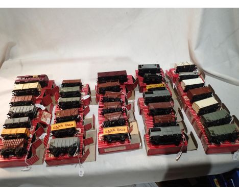 Thirty three Hornby Dublo 2/3 rail wagons, including horse box with horse, mostly very good condition, boxes are fair. UK P&a