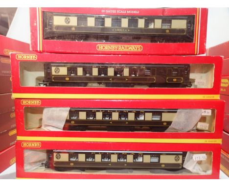 Four Hornby OO gauge Pullman coaches, excellent condition, boxes with wear. UK P&amp;P Group 1 (£16+VAT for the first lot and