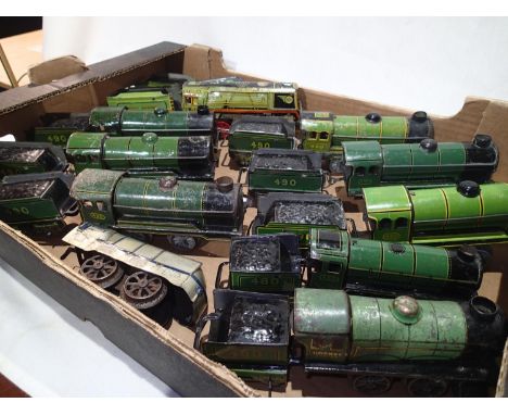 10 unboxed O gauge, clockwork engines appearing in play worn condition by Hornby and Mettoy. One single engine and two tender