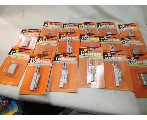 OO scale, seventeen packs of Hornby Skale lighting, including power strips, extensions wires and fuses, all all new/carded. U