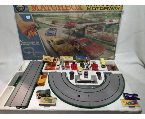 Matchbox Motorised Motorway, two boxed cars, three empty car boxes and seven unboxed cars. Items appear in VG condition, the 