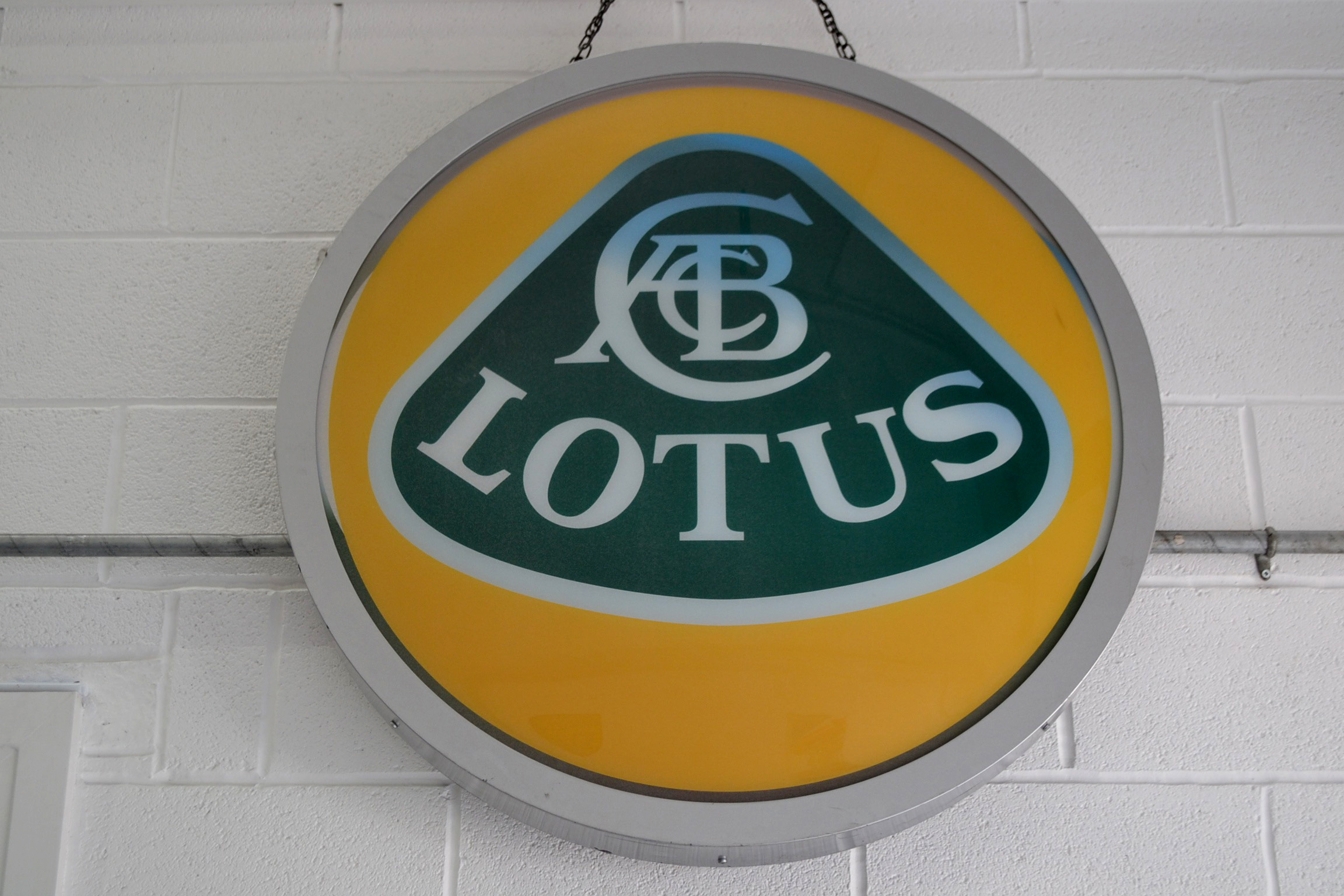 Lotus round all sign, came from original lotus dealer, perfect working