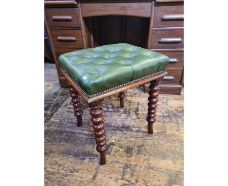 Victorian bobbin leg mahogany foot stool with green leather button top.