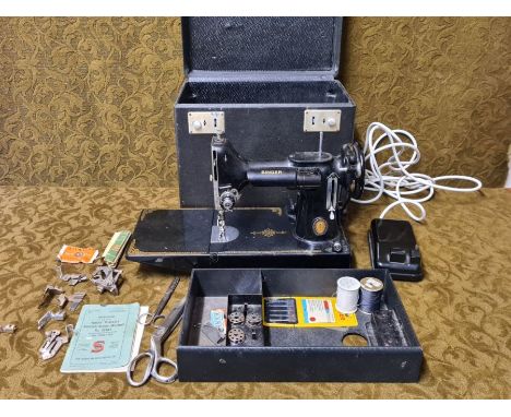 Rare Singer 221K1 Featherweight sewing machine with original case complete with accessories, foot pedal and work lamp, in wor