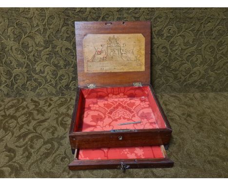 Victorian mahogany artist box with advertising panel, Ackermann & Co. and a pin secured drawer.
