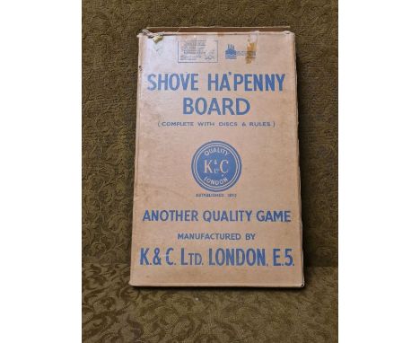 Vintage K & C Ltd shove ha'penny board with original playing pennies and box.