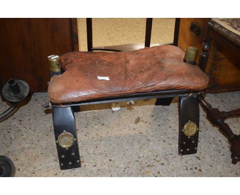 A vintage camel stool
