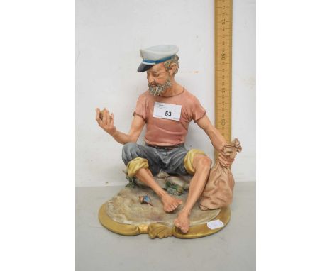 A vintage capodimonte figure of a sailor