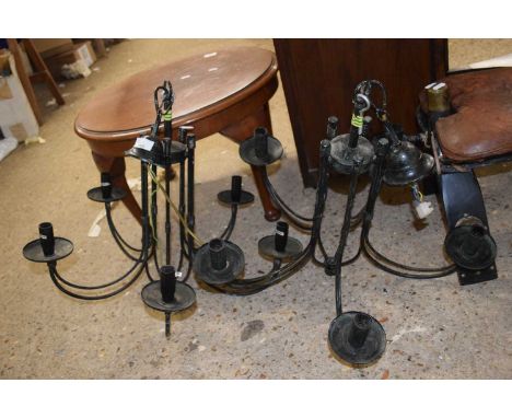 A pair of modern five branch ceiling light fittings