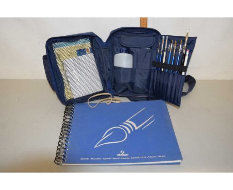 A Windsor &amp; Newton artists travel bag and contents together with a further sketch pad