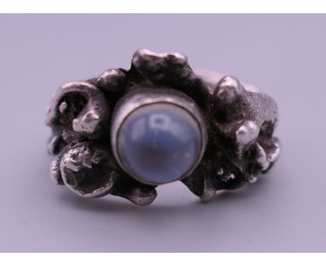 A silver and moonstone ring. Ring size N/O.