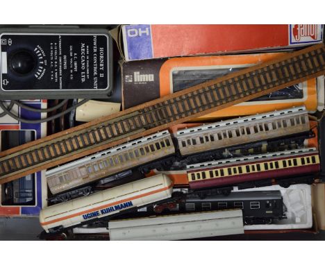 A quantity of various H O gauge carriages and other rolling stock, including Hornby and Lima. 