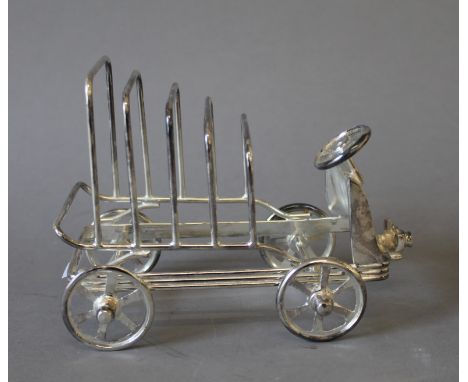 A silver plated vintage car form toast rack. 16 cm long.