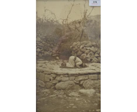 Two vintage Indian prints, one of a man praying, the other of a coastal town, each framed and glazed. The former 22 x 38 cm, 