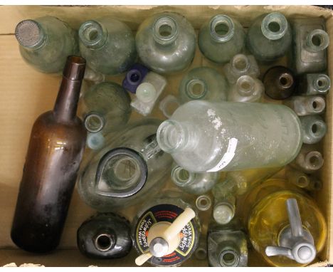 A quantity of glass bottles, including vintage Coca Cola.