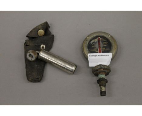 A vintage Boyce Motometer and a Schnader Balloon Tyre Gauge. 