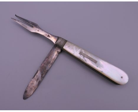 A mother-of-pearl penknife and fork.  8.5 cm long.
