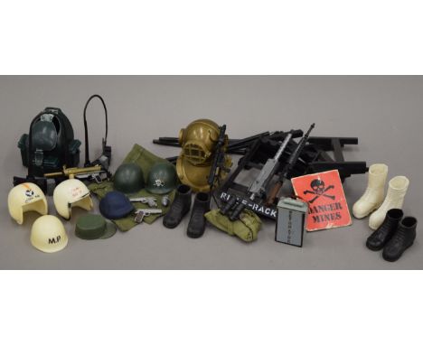 A quantity of vintage Action Man accessories.