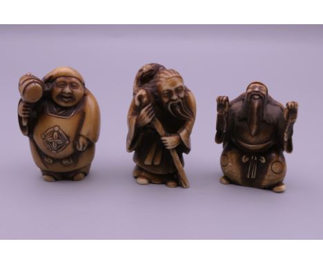 Three netsuke.  Tallest 5 cm high.