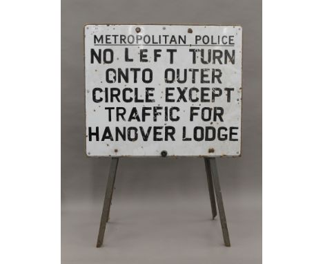 A Metropolitan police enamel sign, mounted on a stand. 69.5 cm wide.