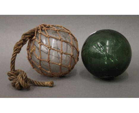 Two vintage glass floats. 