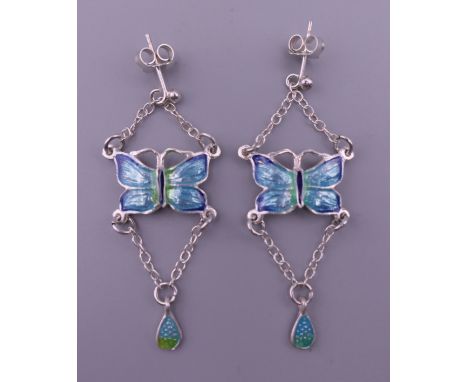A pair of silver and enamel butterfly earrings.  4 cm high.