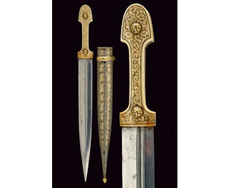 A beautiful kindjal for a woman or a boy dating: mid-19th Centuryprovenance: CaucasiaStraight, double-edged blade with deep, 