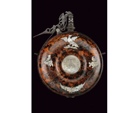 An exceptional powder-flask with Archbishop coat of arms dating: 17th Centuryprovenance: GermanyCircular, round body of fine 