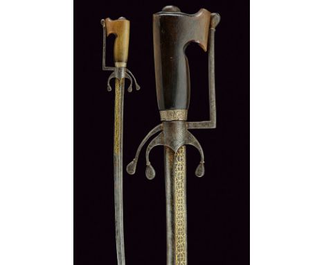 A nimcha dating: 19th Centuryprovenance: MoroccoCurved, single -and false-edged blade with rear groove, the first part decora