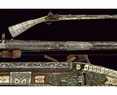 A mother of pearl decorated miquelet flintlock gun dating: first quarter of the 19th Centuryprovenance: BalkansSmooth, two-st