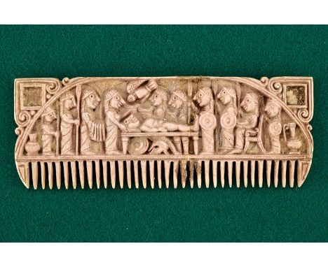 A comb dating: 800 - 400 B. C.provenance: Eastern EuropeFinely chiselled horn, with the bas-relieved effigy of a group of sol